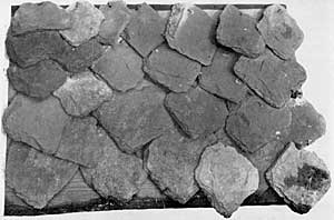 PLATE XXIII. Roofing slates of a late building.