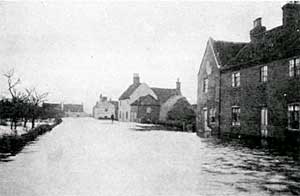 A PORTION OF DUNHAM VILLAGE IN FLOOD, DECEMBER, 1910