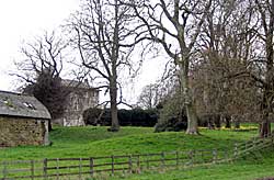 Ditch and bank around outbuildings at Greasley Castle Farm may indicate the remains of a moat (photo: A Nicholson, 2004).