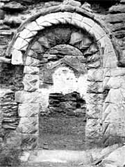 The Norman south doorway of Haughton chapel in the 1920s.