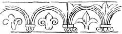 Carving on riser to altar step