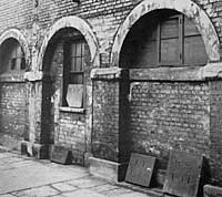 Yard at Shire Hall with headstones for executed prisoners.