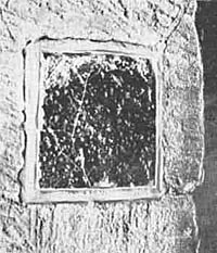 Pax stone in church porch, St. Leodegarius, Basford