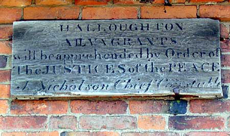 Notice on barn wall at Halloughton, near Southwell