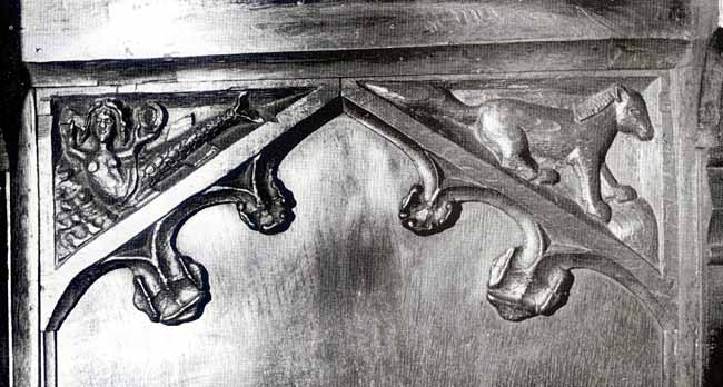 CARVINGS OF MERMAID AND HORSE ON THE BACK PANELS OF THE CHOIR STALLS.