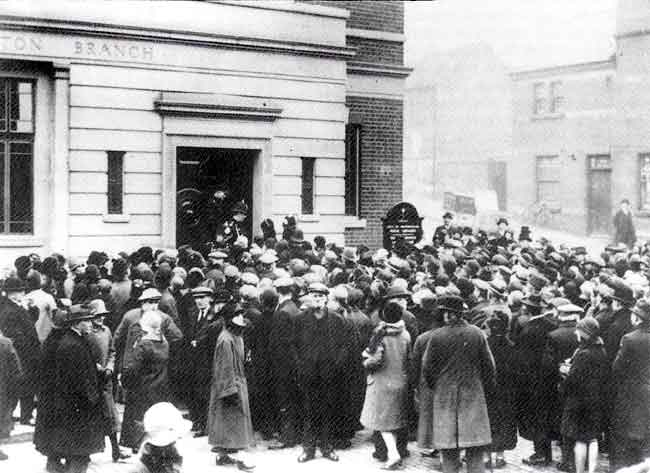 OPENING DAY at Sneinton Branch Library, March 12th 1929. Beyond the onlookers, an interesting variety of wheeled vehicles may be seen in Lord Nelson Street.