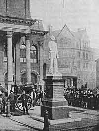 THE STATUE OF SAMUEL MORLEY in Theatre Square. The Evening Post building is in the background.